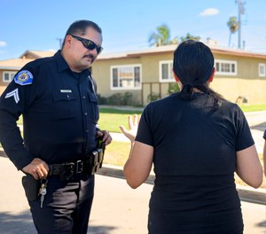 Garden Grove Cpl. Luis Ramirez responds to a call along with the Be Well team on Wednesday, Oct. 19, 2022. Crisis Intervention Specialists Victor Reyes and Victoria Tran offer mental-health support, services and follow up.