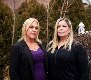 Jessica Bowers, a former deputy warden in the Philadelphia Department of Prisons, and Heather Malloy, a former correctional officer, pose for a portrait in Northeast Philadelphia. They worked together for years, and both quit in 2021.