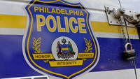 Philadelphia police officer shot twice while responding to armed robbery