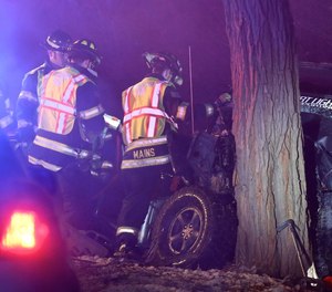 Woodstock Fire and Rescue District firefighter Ryan Mains at a triple fatal accident on Lily Pond Road on Dec. 16, 2018, in Woodstock.
