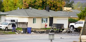 Residents woke up to debris left from a Learjet that crashed Monday night near El Cajon, California. Officials were on scene Tuesday talking to residents of the unincorporated area of Bostonia.