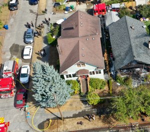 Seattle police and fire teams respond to a fire and reported shooting at a Wallingford home.