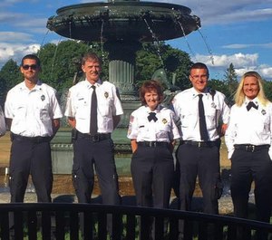 Dan McCall, fourth from right in a group photo with other West Brookfield Rescue Squad members from a few years ago. (Photo/Tribune News Service)