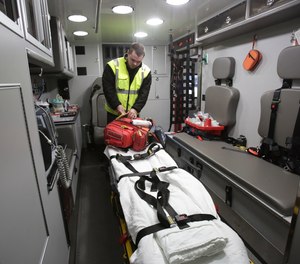 Massillon Firefighter-Paramedic Zach Runion goes over a supply check in a squad. The Massillon Fire Department began providing medical transports 10 years ago as a way to both save money in EMS fees and generate revenue.