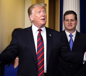 President Donald Trump arrives in the Brady Press Briefing Room of the White House, followed by White House press secretary Sarah Huckabee Sanders, on Jan. 3, 2019, in Washington, D.C. (Oliver Contreras/Sipa USA/TNS)