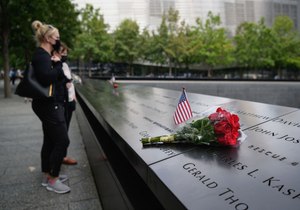 A couple stands at the National September 11 Memorial on Sept. 8, 2021. “The petition to add uterine cancer to the list of covered conditions was filed in September 2020, which means that it’s now been more than two years without a decision from the Department of Health and Human Services,” said Rep. Carolyn Maloney. “In the 21 years since 9/11, too many people have been diagnosed with uterine cancer as a result of exposure to toxic chemicals, pulverized drywall and powdered cement.”