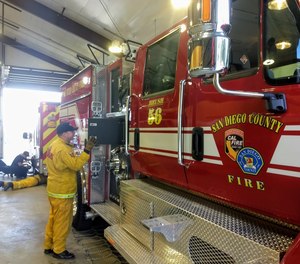A new San Diego County Fire Authority brush engine is one of several vehicles now assigned to the former Julian volunteer station. County firefighters took up 24/7 residence at Station 56 on Wednesday. (Photo/J. Harry Jones, San Diego Union-Tribune)
