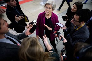 Sen. Elizabeth Warren, D- Mass., talks with reporters following the weekly Democratic Senate policy luncheon at the U.S. Capitol on March 15. Warren was reportedly seen looking at the damage to her son's home Tuesday.