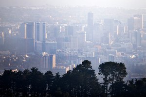 Hazy skies from the wildfires cover Oakland and the East Bay as seen from the Berkeley hills in Berkeley, Calif., on Sept. 2.