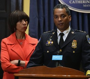 Baltimore Mayor Catherine E. Pugh listens as new Baltimore Police Department Commissioner Darryl DeSousa makes remarks at City Hall on Jan. 19 2018 in Baltimore, Md.
