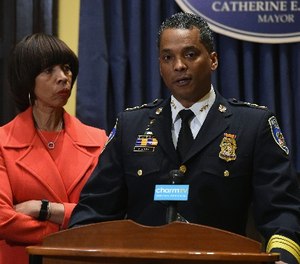 Baltimore Mayor Catherine E. Pugh listens as new Baltimore Police Department Commissioner Darryl DeSousa makes remarks at City Hall on Jan. 19 2018 in Baltimore, Md.