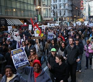 Sub. Activist groups take over RandolphStreet as a protest, Justice for Laquan, marches as the city council meets, Wednesday, Dec. 9, 2015 in Chicago.