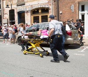 Multiple people were injured when a vehicle plowed into pedestrians in downtown Charlottesville, Va., following confrontations between alt-right followers and liberal activists on Saturday, Aug. 12, 2017.