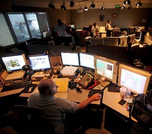 Boynton Beach 911 Communications Supervisor Brian McNevin monitors 911 calls and police and fire department dispatching from his communication terminal, September 9, 2010, in Boynton Beach, Florida. (Mark Randall/Sun Sentinel/MCT)