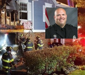 Officer Bill Wise helped rescue a 14-year-old boy who was trapped in the basement during a house fire.