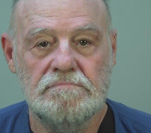 Police say Ronald Duell pulled a knife and threatened first responders after being placed in an ambulance Saturday night. He faces multiple felony charges.