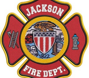 The Jackson Fire Department in Tennessee reported that one of its firefighters was injured when a crowd attacked first responders with a 