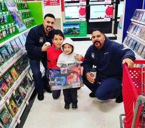 Sworn and associate VHB members at a “Shop with a Firefighter” holiday event.
