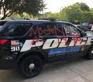 Last week in Georgetown, Texas, a police sergeant woke up to find graffiti painted all over his squad car, which was parked in the driveway of his home.