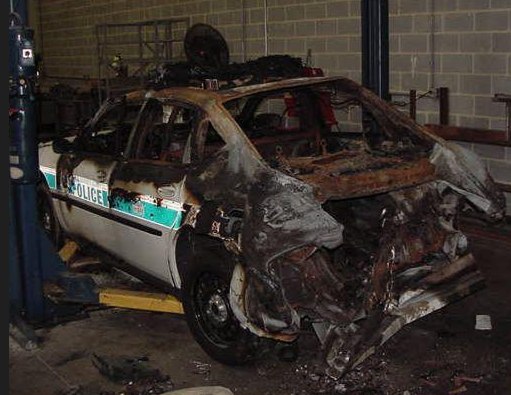 Fire investigators concluded that a container of windshield washer fluid in the trunk was compromised during the collision.