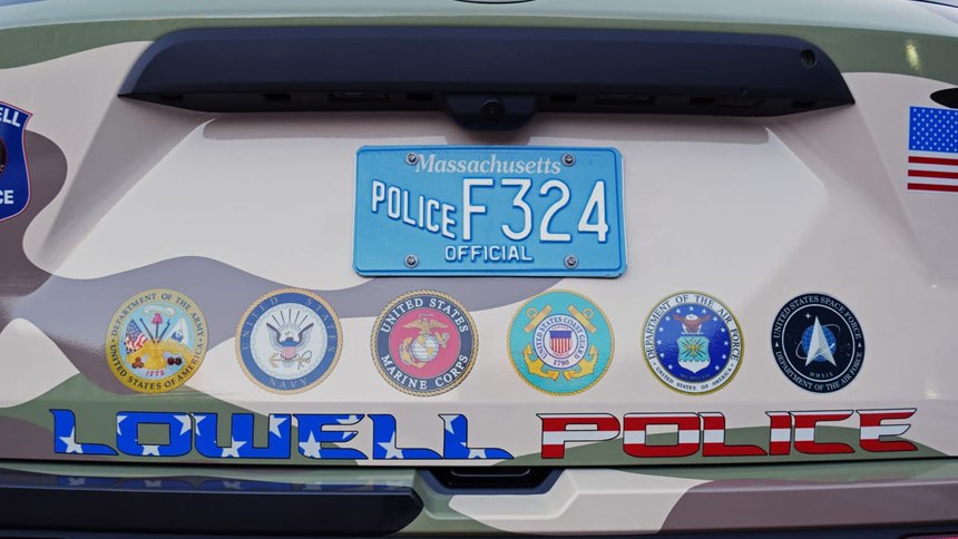 Each of the country's six branches of the military — the Army, Navy, Marine Corps, Coast Guard, Air Force and Space Force — are represented on the back of the Lowell Police Department's new cruiser.
