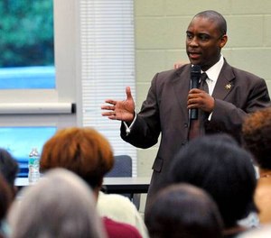Victor Hill speaks at a candidate forum in Rex, Ga., on Aug. 16, 2012.