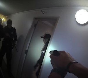 The moment Joseph Robert Henry Thompson answered his apartment door holding a gun and shot at police.