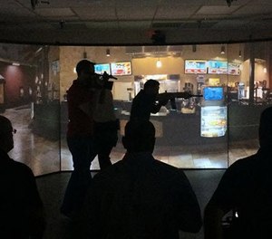 Virtual reality training provides realistic interaction scenarios that are difficult to reproduce consistently on a live-fire range. (image/VirTra)