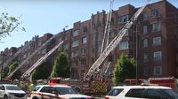 Unusual 3-alarm fire in Boston apartment building burns two separate floors