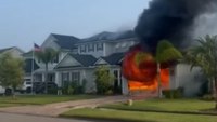 Video: Luxury EV catches fire, destroys Fla. house