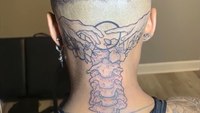 Ala. firefighter fired for neck tattoo files discrimination suit