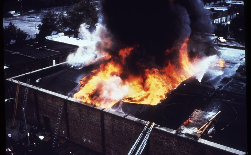 The area of origin was identified as the mezzanine. The mezzanine was scheduled to be removed as part of the renovation. The fire traveled vertically into the space above the mezzanine and then into the truss area.
