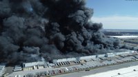 Video: FF injured as crews continue work on Walmart warehouse fire