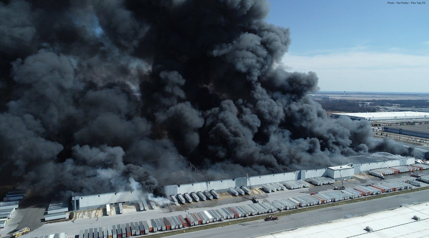 Crews took a defensive position at the Walmart warehouse fire in March.