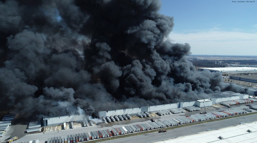 Crews took a defensive position at the Walmart warehouse fire in March.