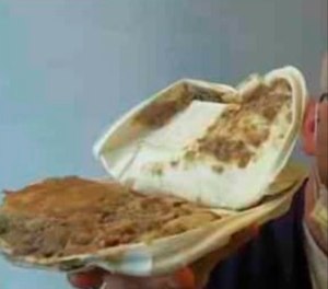 A Coyote Ridge Corrections Center inmate displays a meal via an image taken at a communication kiosk inside the prison. A family member posted this image to a Facebook support group. (Courtesy photo)