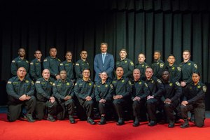 Sheriff Lew Evangelidis recently swore in 20 new corrections officers after completion of Basic Recruit Training Academy