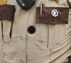 Olmsted County Sheriff's Deputy Heather Johns displays the office's BodyWorn cameras. (image/Emily Cutts, Post Bulletin)