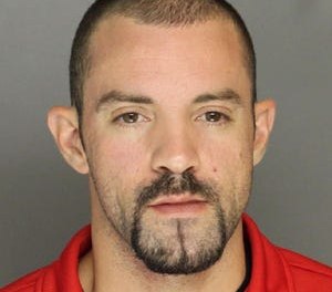 Police say Christopher Garrison, 28, crashed his vehicle last week while impersonating a first responder. This mugshot shows Garrison after his arrest last year for allegedly impersonating an undercover police officer in a separate incident.