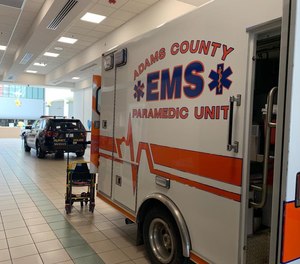An Adams County ambulance was struck by a Quincy Police Department vehicle in front of a hospital on Thursday afternoon.
