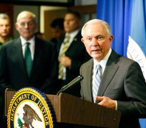 Attorney General Jeff Sessions, right, speaks as Homeland Security Secretary John Kelly listens after the pair toured the ports of entry and met with Department of Justice and DHS personnel in El Paso, Texas, Thursday, April 20, 2017. (Ruben R. Ramirez/The El Paso Times via AP)