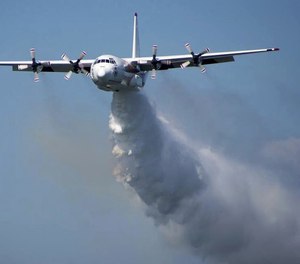 In this undated photo released from the Rural Fire Service, a C-130 Hercules plane called