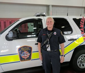 Bradley International Airport firefighter-paramedic Christina Palumbo was awarded for responding to three separate cardiac arrest calls and helping the passengers regain consciousness.