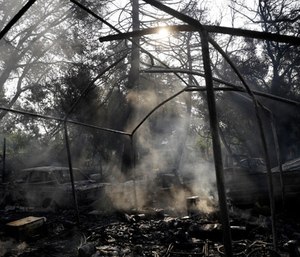 Two months after the wine country fires, officials still debate whether more could have been done to give residents earlier warnings. (Photo/AP)