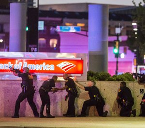 Dallas Police respond after shots were fired at a Black Lives Matter rally in downtown Dallas on Thursday, July 7, 2016. Dallas protestors rallied in the aftermath of the killing of Alton Sterling by police officers in Baton Rouge, La. and Philando Castile, who was killed by police less than 48 hours later in Minnesota.