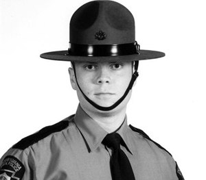 This undated file photo provided by the Pennsylvania State Police shows Trooper Alex Douglass.