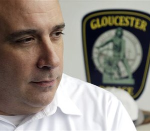 Police Chief Leonard Campanello poses at his office in Gloucester, Mass., Monday, June 1, 2015.