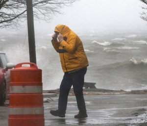 An 11-year-old boy in New York state is the fifth person reported killed by downed trees in a fierce winter storm bringing high winds and heavy rain to the East Coast. (Photo/AP)