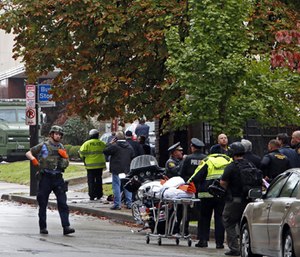 First responders surround the Tree of Life Synagogue in Pittsburgh, Pa., where a shooter opened fire Saturday, Oct. 27, 2018.