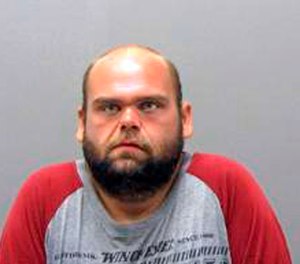 This undated photo provided by the Hot Springs Police Department shows Jonathan Scott.